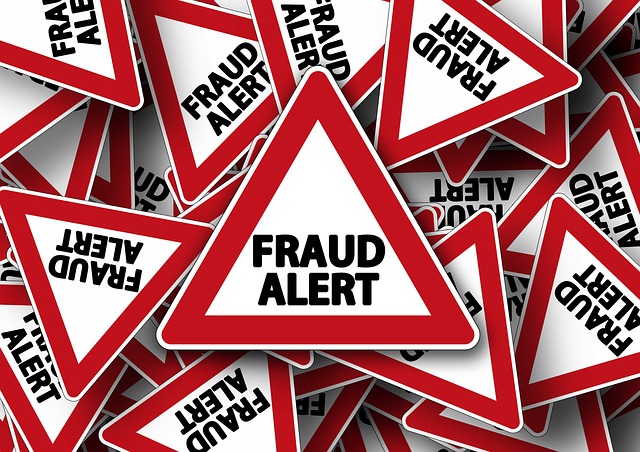 tax identity fraud alert with caution signs
