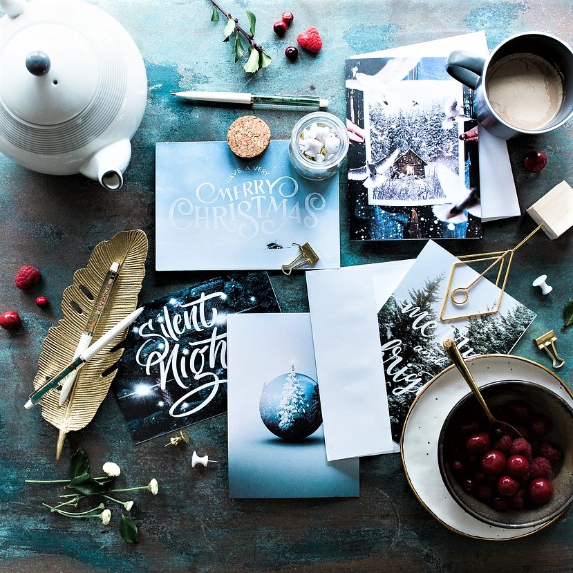 Save and budget for the holidays with festive blue cards to pass out for Christmas.