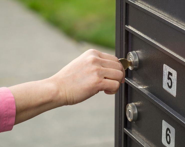 Lady checking mail to get IRS Form 4883c Letter