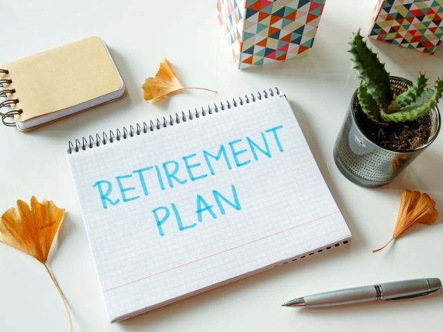 Retirement plan written on white notebook