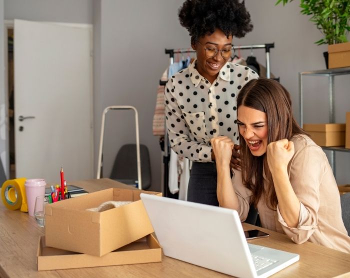 Small business owners happy to be registering for IRS form 2553 on computer