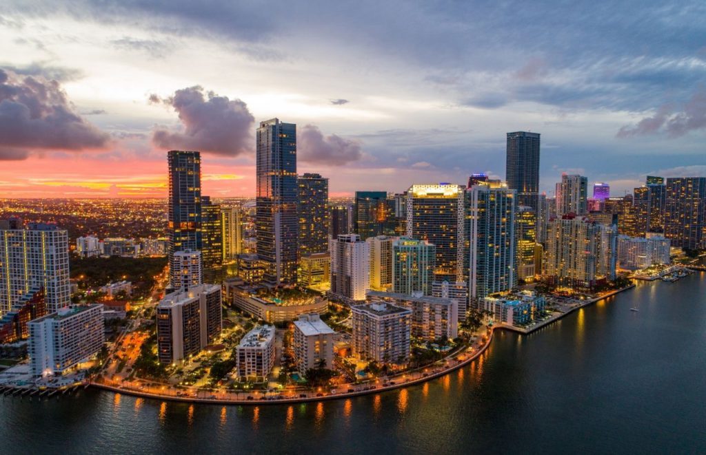 Downtown Miami Florida at Nighttime with the need to figure out Per Capita Tax