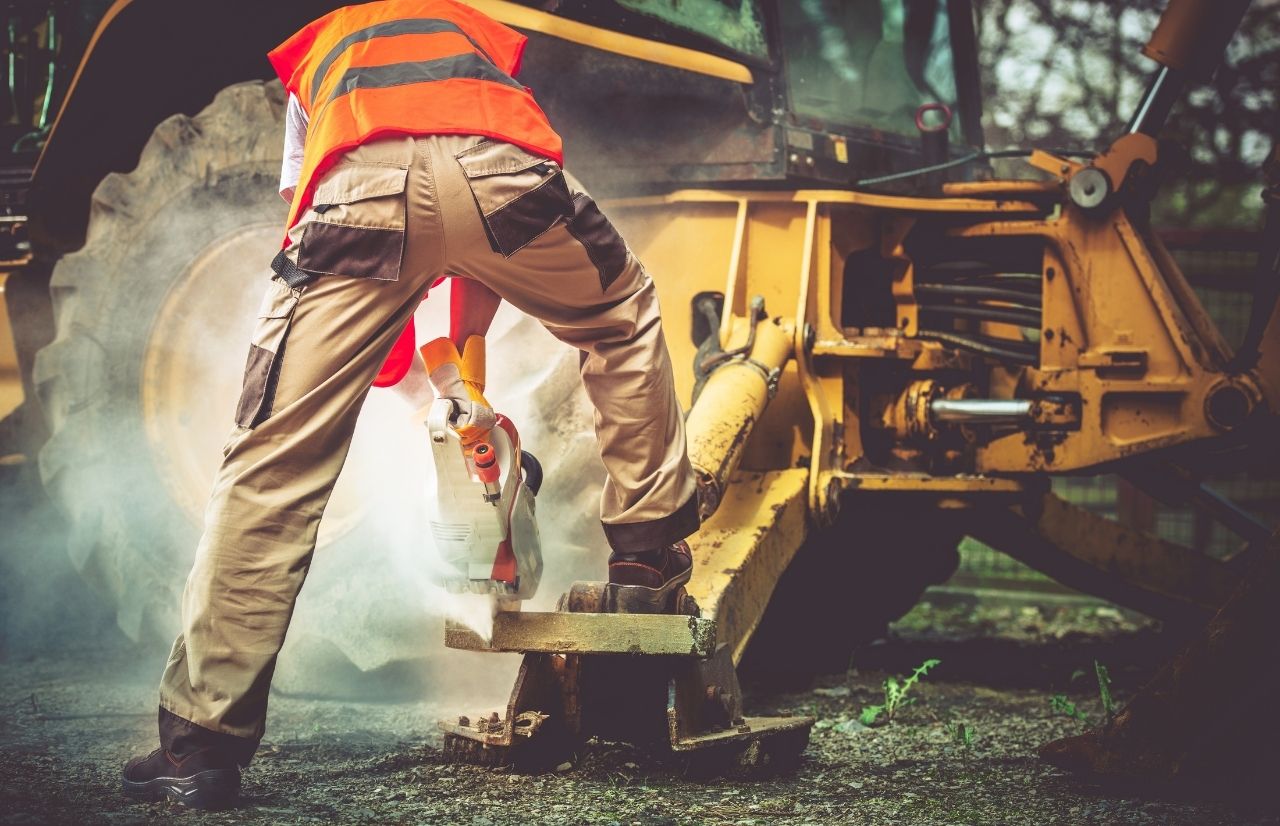 Man drilling into the ground