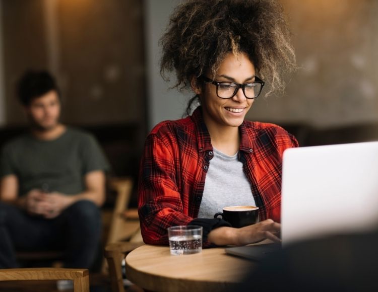 black woman gamer reading on laptop are twitch donations taxable