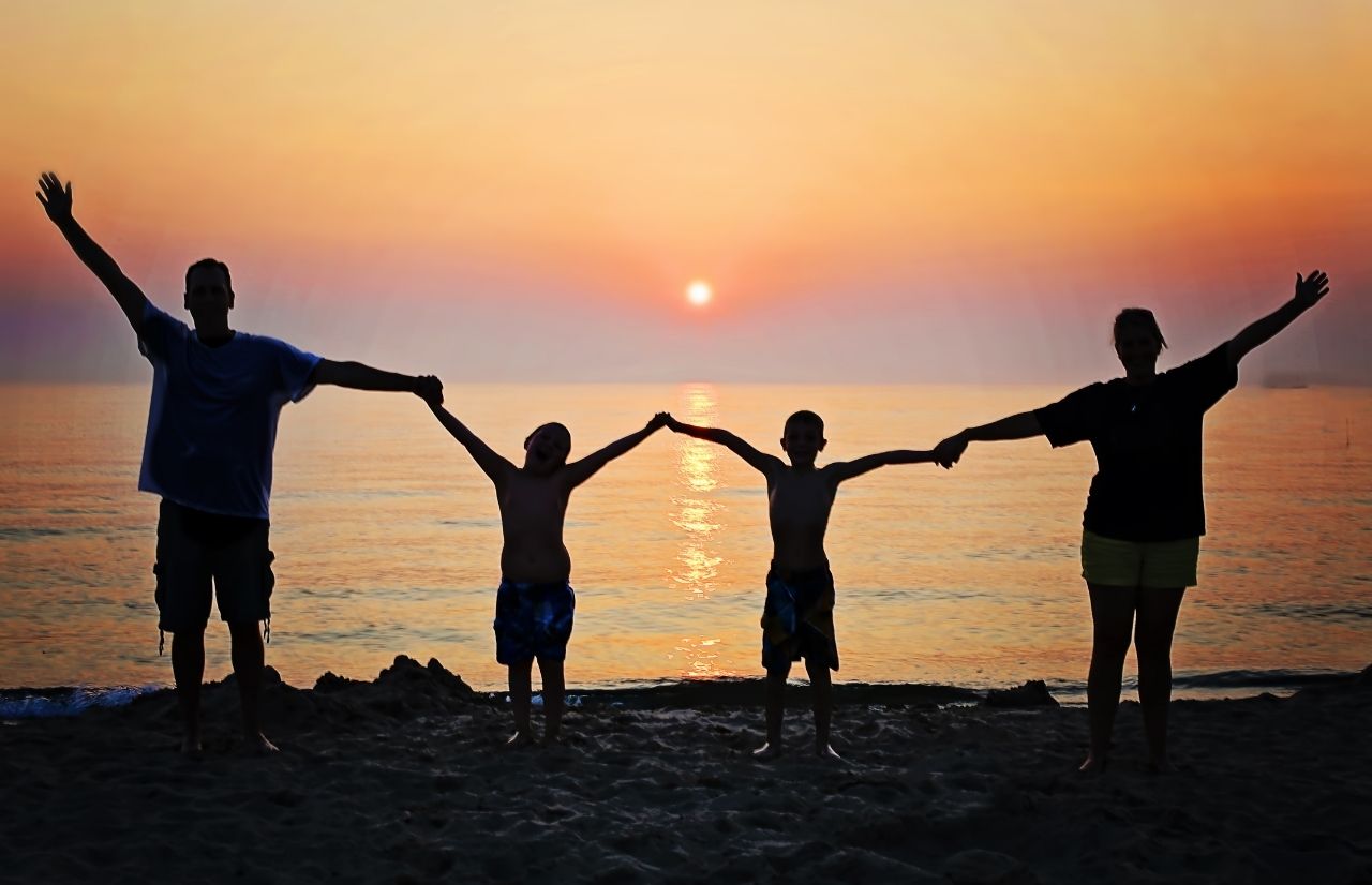 Child Tax Credit with family in sunset over ocean