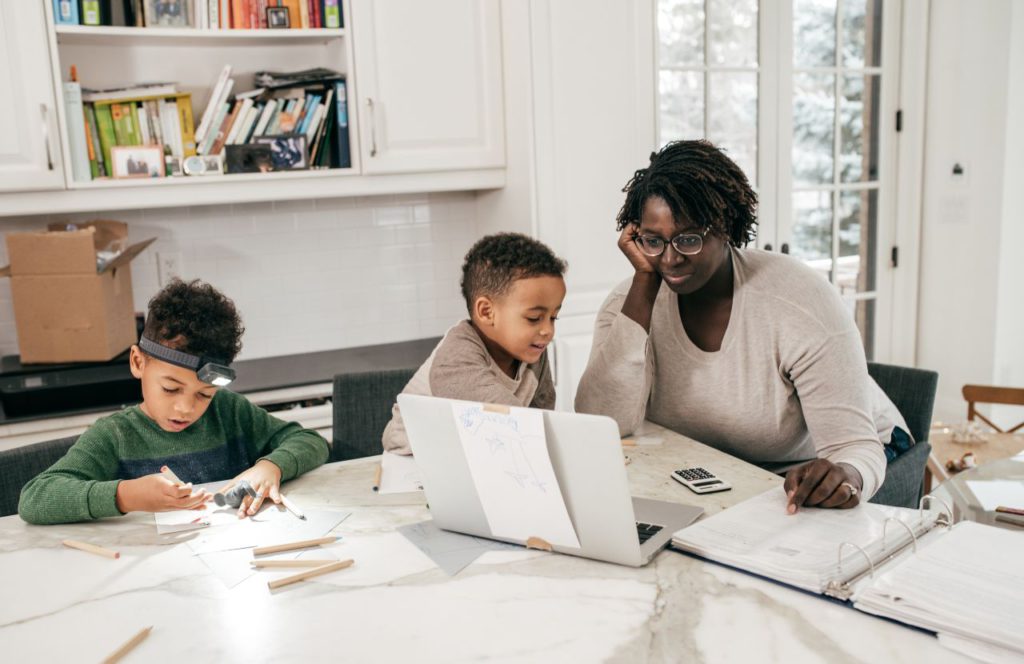 woman meticulous record keeping for maximizing hair stylist tax deductions