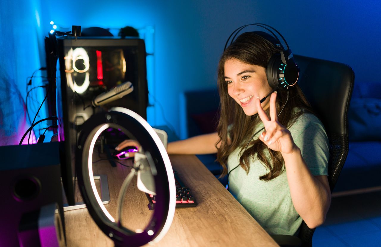 female online game streamer putting up peace sign and asking are twitch donations taxable