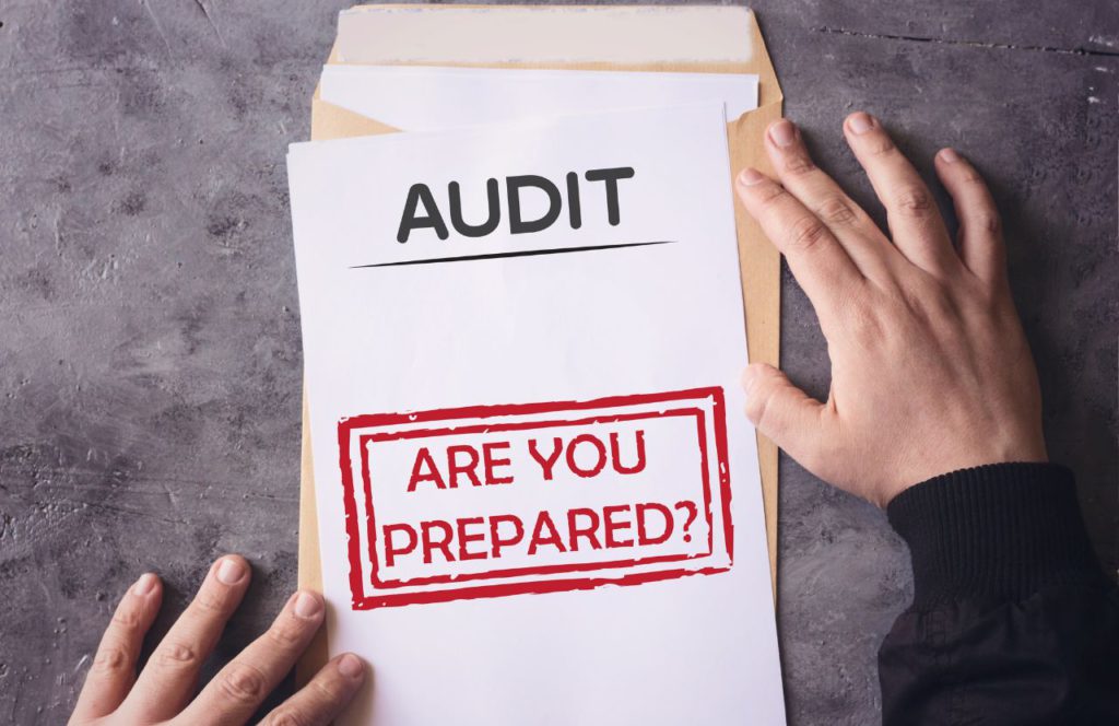 piece of paper with audit are you prepared written on it